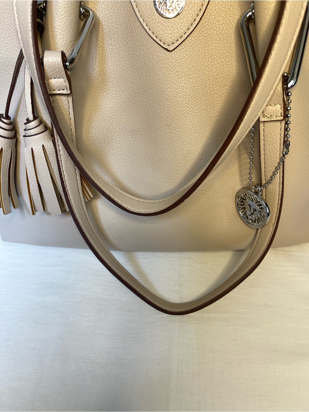 Anne Klein Taupe Vegan Pebbled Texture Tote with Lion & Tassel Charms - Picture 12 of 16